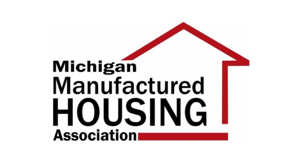 Logo of the Michigan Manufactured Housing Association with black text and a red outline of a house above and to the right of the text.